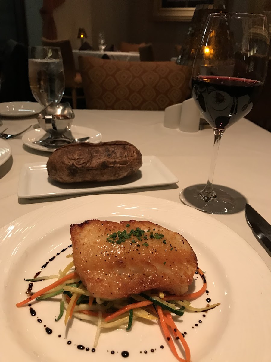 Eddie Merlot's signature dishes 8 oz. Filet MignonPan Roasted Sea BassLounge Steak DianeTomahawk Wagyu Ribeye